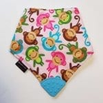 pink monkey teething bib