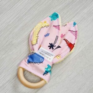 pink dinos teething ring